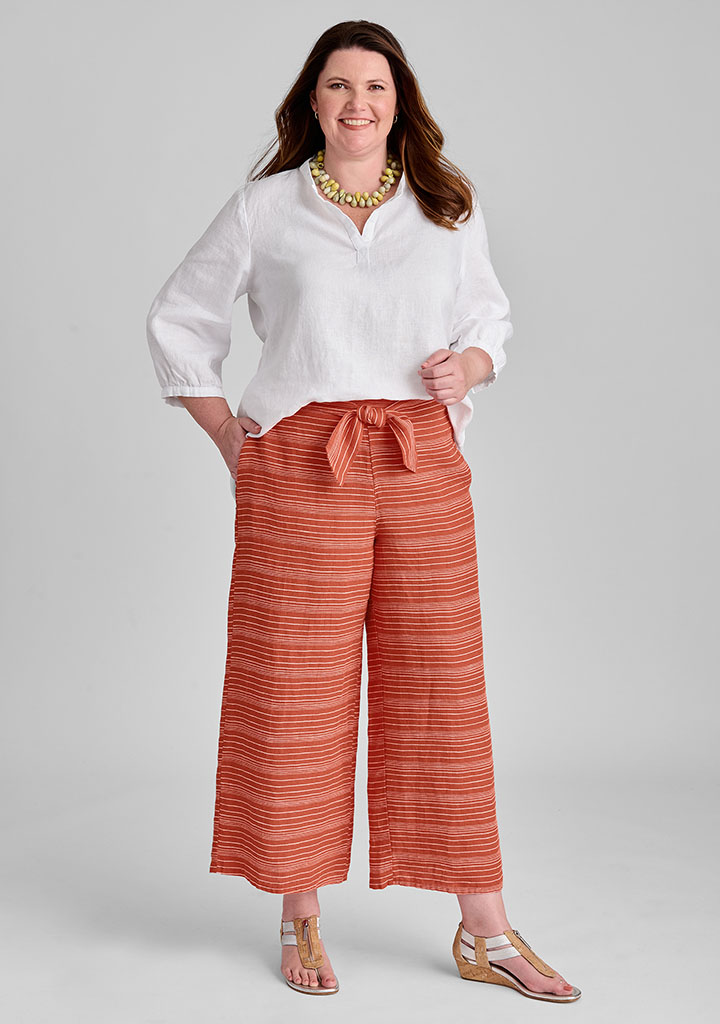 White linen top with orange linen pants