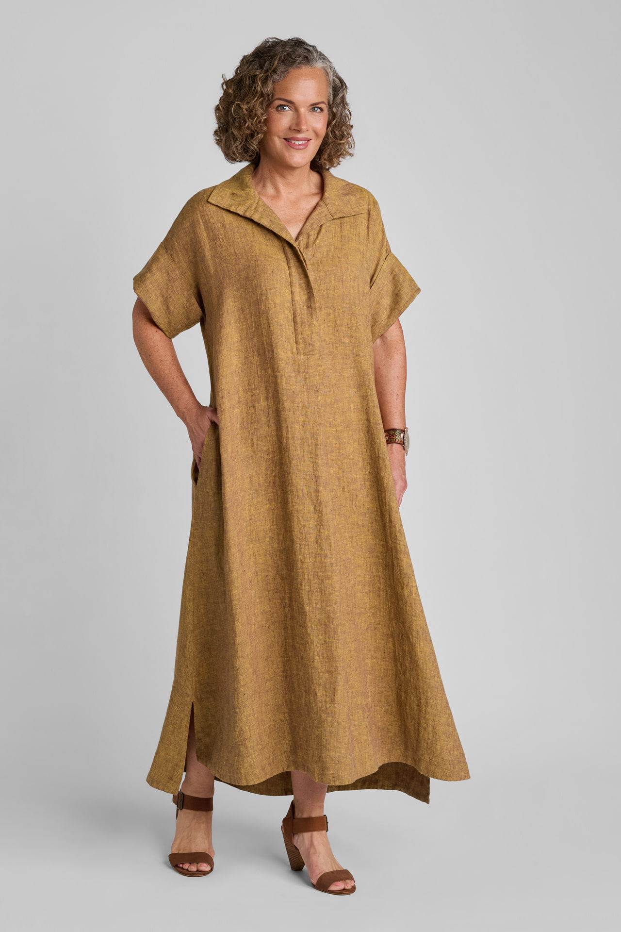 Woman in brown linen shirtdress