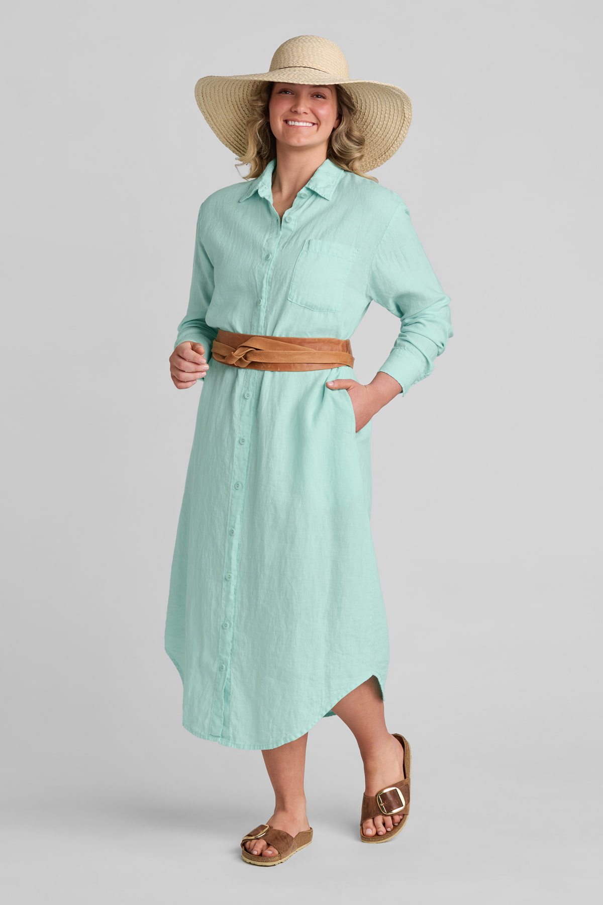 Woman in green linen shirtdress