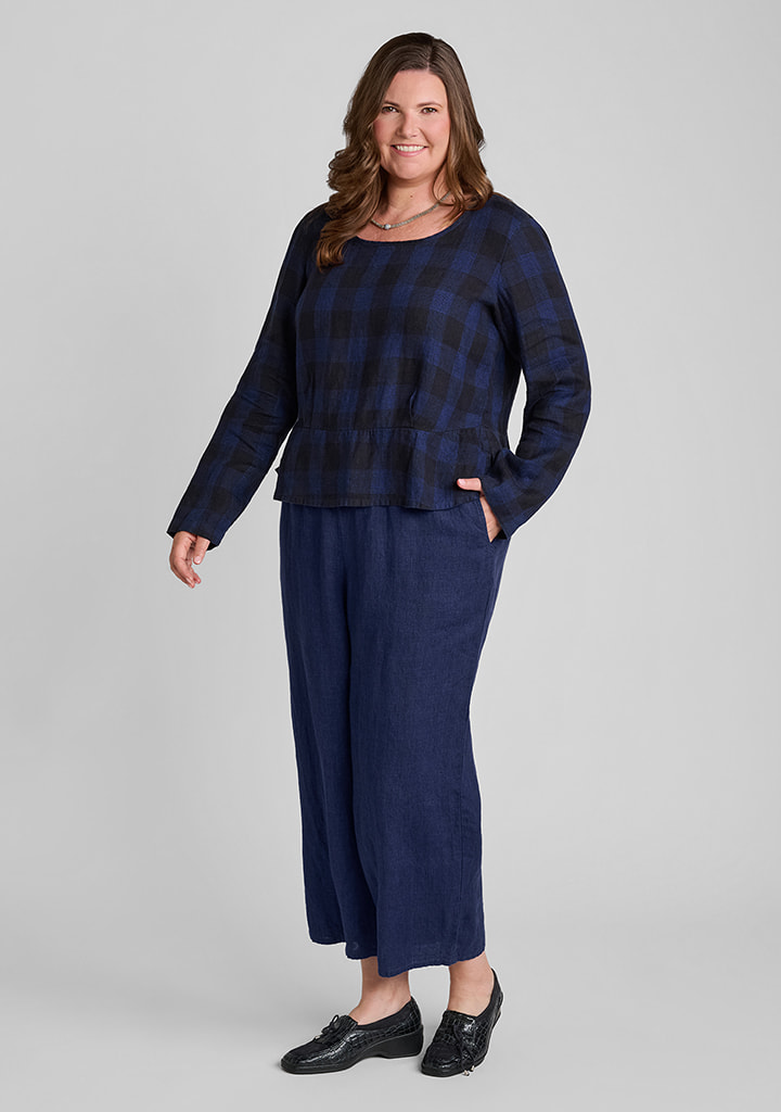 FLAX women's linen outfit featuring Peplum Pullover in Navy Plaid, Floods in Navy Suiting