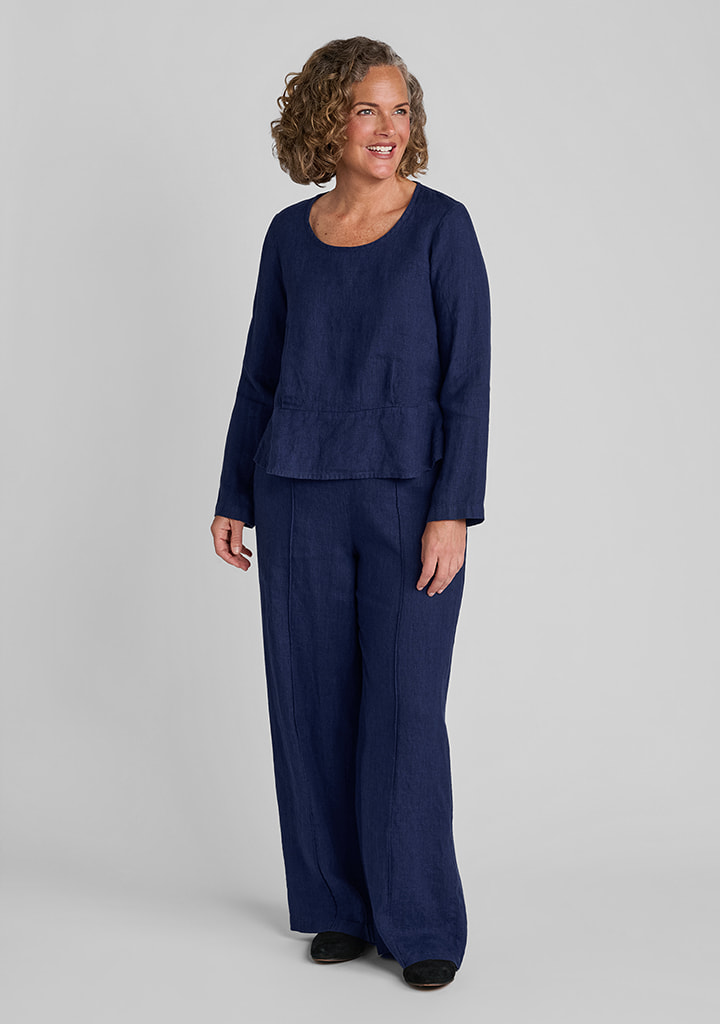 FLAX women's linen outfit featuring Peplum Pullover in Navy Suiting, Pintucked Trouser in Navy Suiting